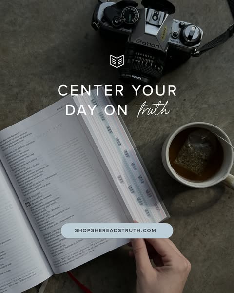This ad encourages the viewer to center their day on truth. An open Bible, camera, and cup of tea are displayed in the i