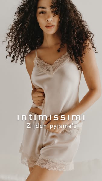 This ad features a woman wearing a silk pajama set from Intimissimi. The ad intends to showcase the pajama and persuade 