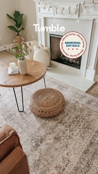 The Tumble brand advertises a site-wide Memorial Day sale. The ad features a living space with a Tumble rug.