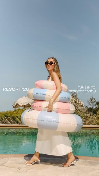The image shows a person standing in front of a pool while holding inflatable rings. Text reads 'Resort '26'