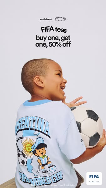 An ad for FIFA t-shirts that are available at Cotton On Kids featuring a buy one get one 50% off promotion.