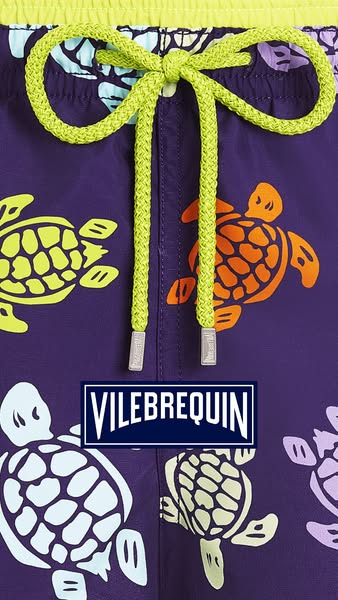 An image of the upper half of Vilebrequin swim trunks is shown, highlighting the design and brand.