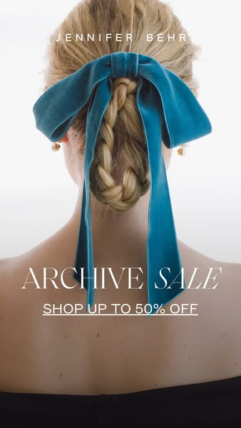 This image ad for Jennifer Behr promotes an archive sale with up to 50% off. The ad features a woman with blonde hair st
