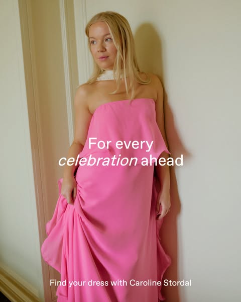 This ad showcases a model wearing a pink dress. The ad encourages viewers to find their dress.