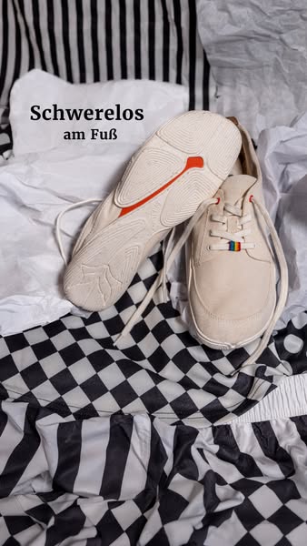 This ad features a pair of beige barefoot dress shoes, highlighting their comfort and minimal design, showcased against 