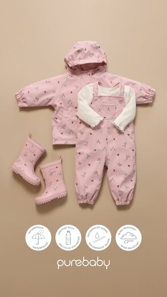 This image ad for Purebaby features an arrangement of a rain jacket, overalls, and rain boots, all in a matching floral 