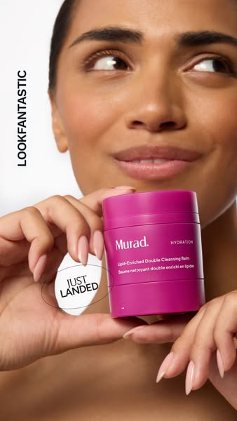 This ad for Murad Lipid-Enriched Double Cleansing Balm features a woman holding the product and copy emphasizing that it