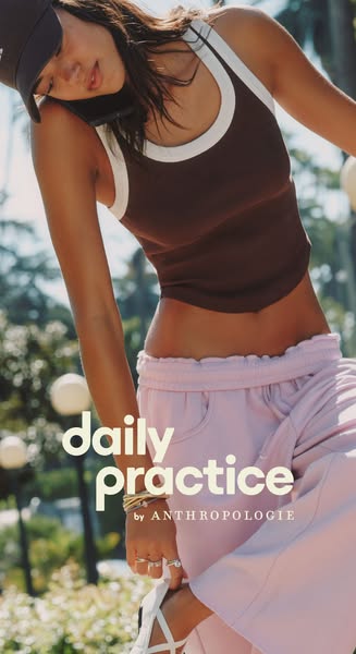 This ad for Daily Practice by Anthropologie features a woman tying her shoe, highlighting the brand's apparel as sui