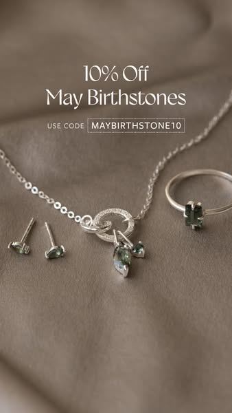 This image ad from a jewelry brand promotes a discount on May birthstone jewelry, featuring a necklace, earrings, and a 