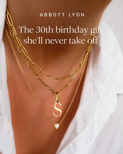 An image ad promoting Abbott Lyon jewelry as a gift for a 30th birthday. The ad features a close-up shot of three gold n
