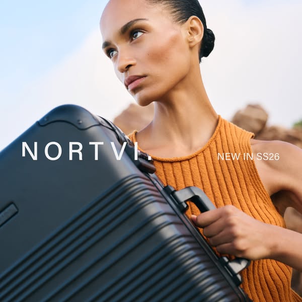 A woman is shown carrying a black suitcase with 'NORTVI' on the side, and 'NEW IN SS26' is on the right 