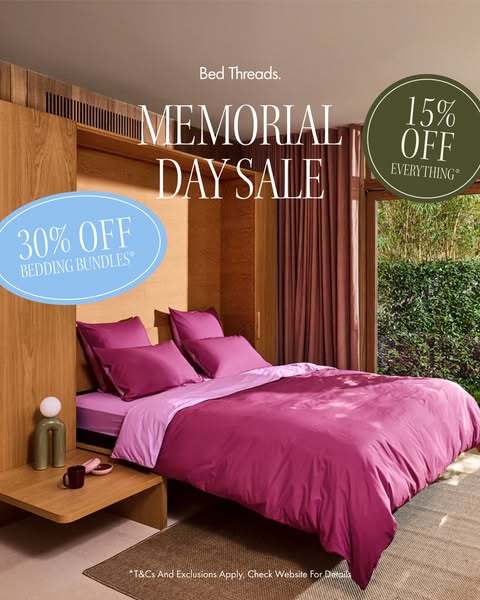 This image ad for Bed Threads promotes a Memorial Day sale on bedding and bedding bundles. The ad features a cozy bedroo