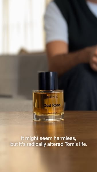 The ad features a close-up of a Horace Oud Rose perfume bottle with text that reads, 'It might seem harmless, but it