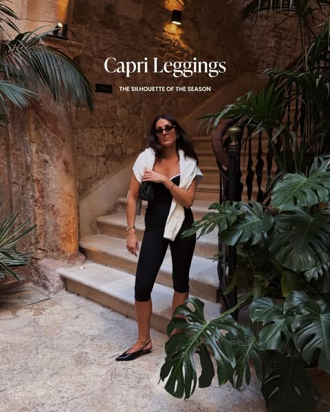 The ad features a woman in capri leggings, a black top, and black shoes, posed in front of an exterior stairway surround