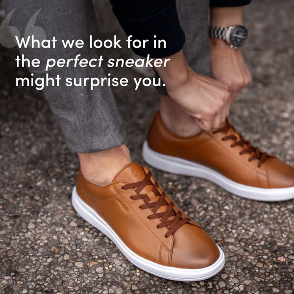 An image showcases a pair of dress sneakers. The headline asks, "What we look for in the perfect sneaker might surp