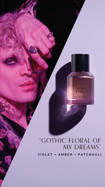An ad for Dirty Violet perfume that is visually gothic and luxurious. It shows a person holding the perfume in front of 