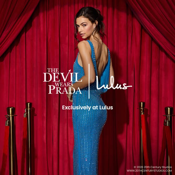 The ad pairs a model in a gown with the title of a film and the logo of a brand. The ad is for Lulus.