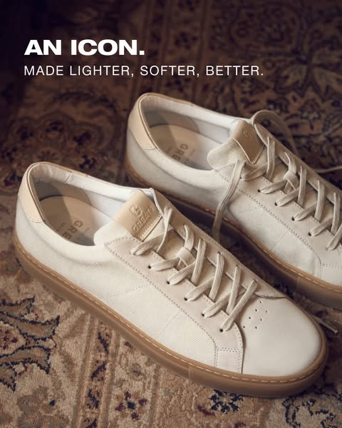 This image ad showcases a pair of off-white Greats sneakers against a vintage rug backdrop.