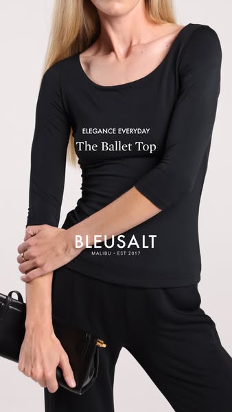 This ad for BLEUSALT features a model wearing a black Ballet Top and black pants. The ad highlights the top's elegan