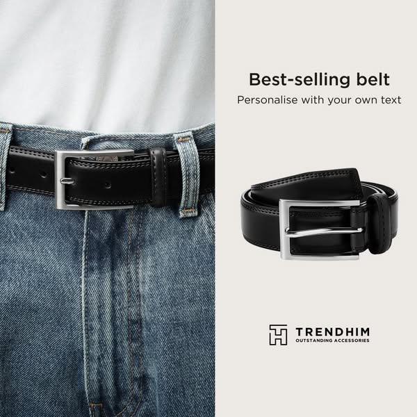This is an image ad for Trendhim belts. The ad features a black belt with a silver buckle, with text offering personaliz