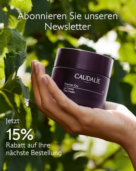 This ad promotes Caudalie's Premier Cru The Cream with an offer of 15% off the next order when signing up for the ne