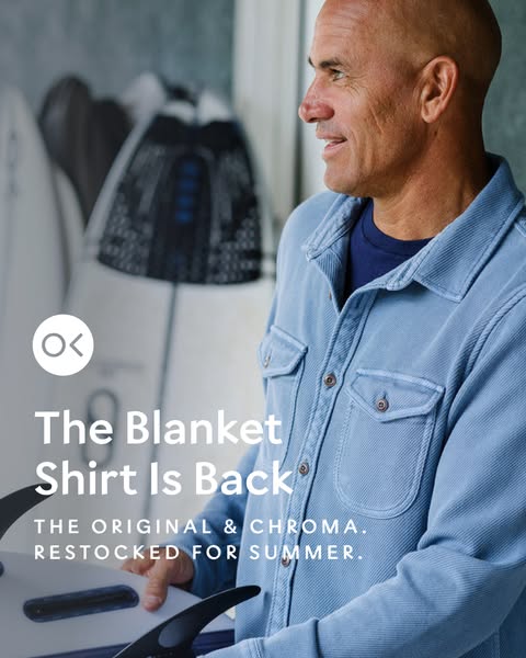 This image ad features a man in a blue button-down shirt holding a surfboard. The ad is promoting the return of the &quo