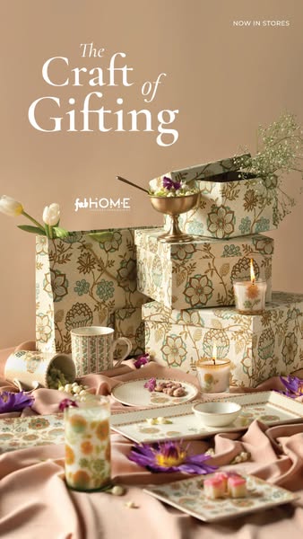 An ad for Fab Home featuring a variety of housewares and gifting items arranged on a table. The ad's headline promot