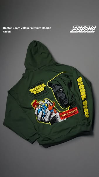This image promotes a green hoodie with a graphic of Doctor Doom and the Fantastic Four. The background is gray and the 