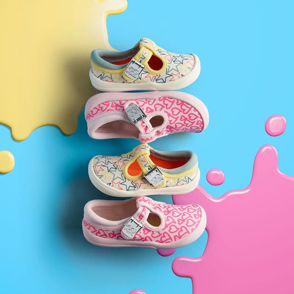 This ad features four children's shoes stacked on top of each other against a blue background with pink and yellow l