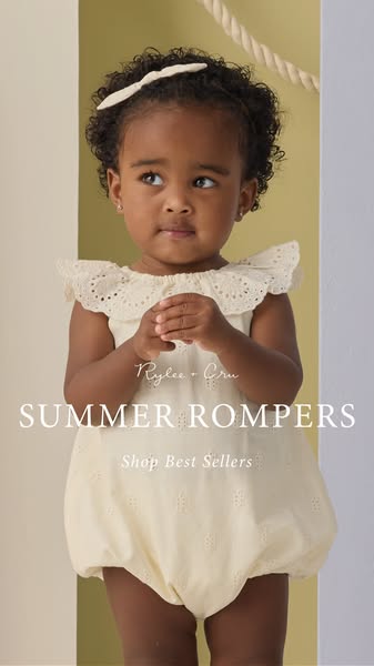 This image ad features a toddler wearing a cream-colored romper from Rylee + Cru with a cream-colored headband. The word