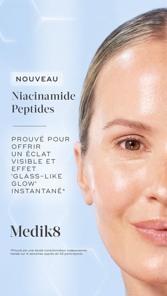 This ad for Medik8 features a close-up of a woman's face, highlighting the 'glass-like glow' effect of the N