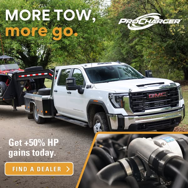 This image ad for ProCharger features a white GMC pickup truck with a red ATV on the trailer, next to the headline '