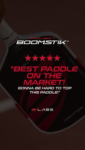 This ad features a close-up of the Project Boomstik paddle with a five-star review. The ad emphasizes the paddle's h