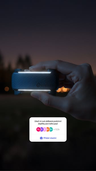 The ad is an image of a hand holding a blue device with illuminated edges that is overlaid with a screenshot of a social