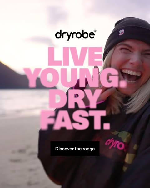 This image ad for dryrobe features a woman wearing a dryrobe on a beach. The ad uses the tagline "LIVE YOUNG. DRY F