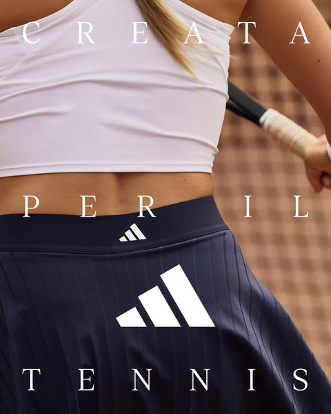 This Adidas image ad showcases a woman's tennis outfit including a white tank top and navy skirt with the Adidas log