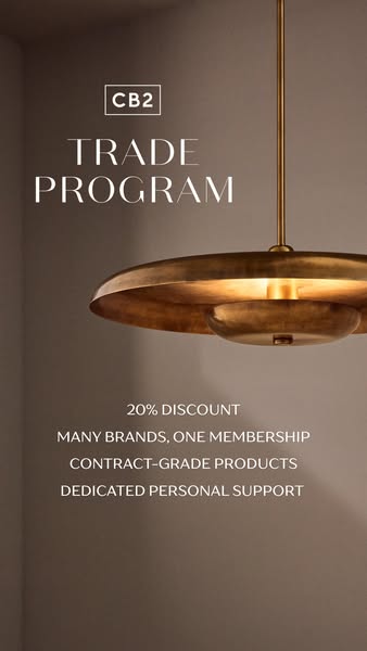 This image ad promotes CB2's trade program, highlighting benefits like a 20% discount, access to many brands, contra