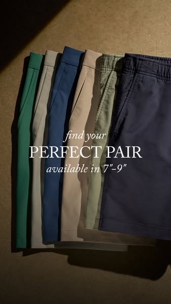 A single image showcases a line of neutral-toned shorts in varying lengths. A shadow falls across the background. The ad