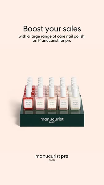 This image ad shows a display of Manucurist care nail polishes on a display stand, promoting the brand's availabilit