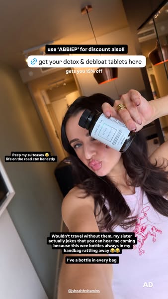 The image is a selfie of a woman who is promoting detox and debloat tablets from JSHealth Vitamins. She mentions that he