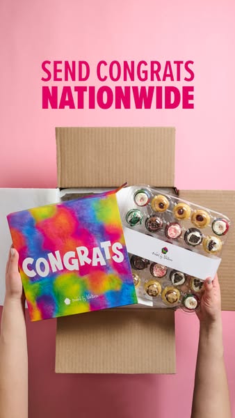 The image ad showcases Baked by Melissa cupcakes in a clear plastic container with a brightly colored 'Congrats'