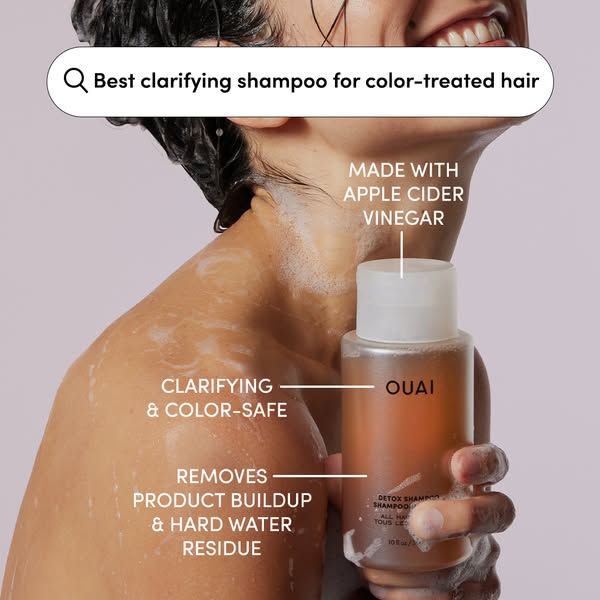 An image ad showing a person using Ouai detox shampoo. The ad points out that the shampoo is made with apple cider vineg