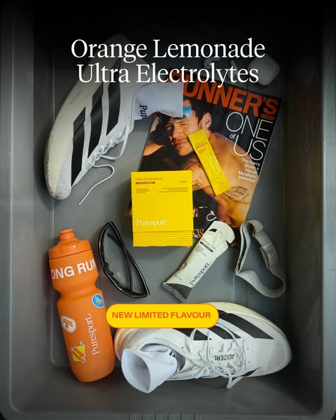 A flat lay image ad for Puresport Ultra Electrolytes. The ad showcases running gear such as shoes, water bottle, sunglas
