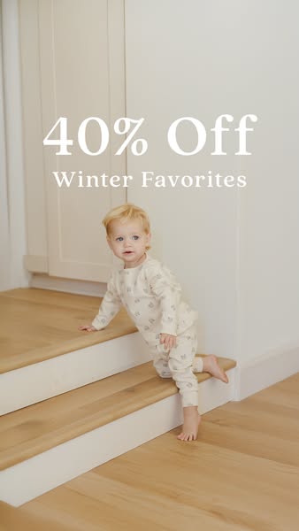 This image ad promotes children's winter clothing with a 40% off discount. The ad features a young child wearing a p
