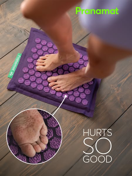 An image ad for the Pranamat featuring a person standing on the mat, with a magnified view of the foot pressing into the