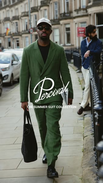 This image ad showcases Percival's Summer Suit Collection, featuring a man in a green suit walking down a city stree