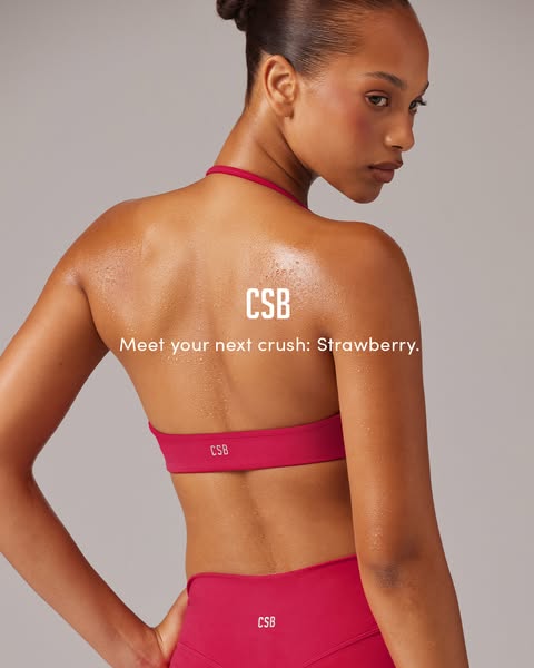 This ad features a person wearing a matching red sports bra and leggings set. The ad copy reads, "Meet your next cr