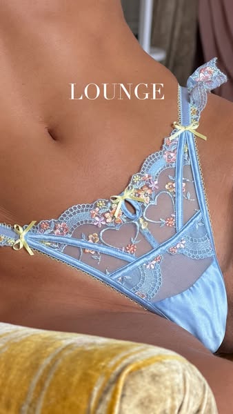 This image ad features lingerie from Lounge Underwear. The ad focuses on the design of the underwear which is blue with 
