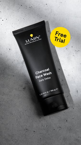 This ad features Lumin's Charcoal Face Wash and promotes a free trial. The ad uses a minimalist aesthetic with a foc