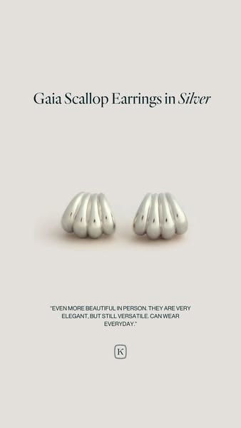This ad showcases the Gaia Scallop Earrings in Silver. The ad also includes a quote about the earrings.